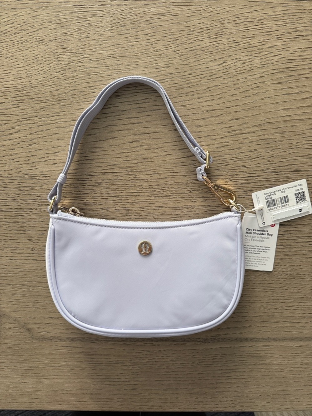 lululemon athletica Mini Shoulder Bag in Light Lavender with Gold Hardware